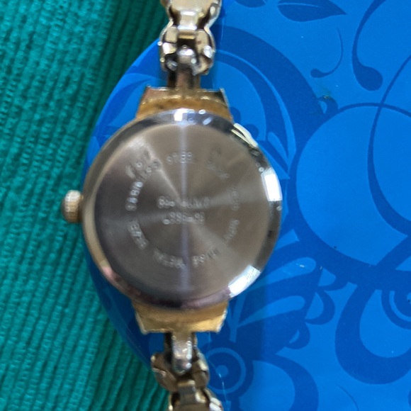 Timeless Women's Quartz Watch with Gold and Silver Accents - Picture 4 of 7